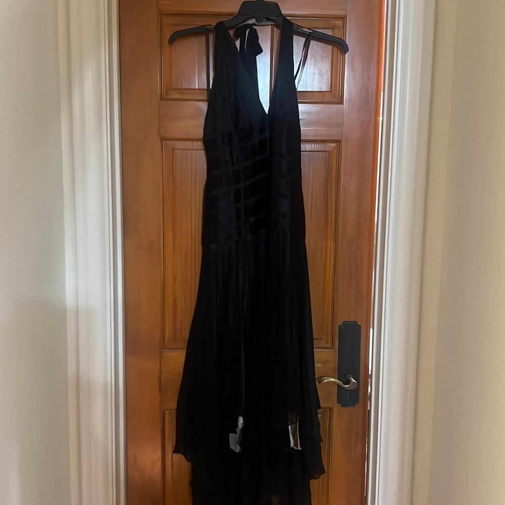 BCBG black chiffon with satin trim. Low V back.